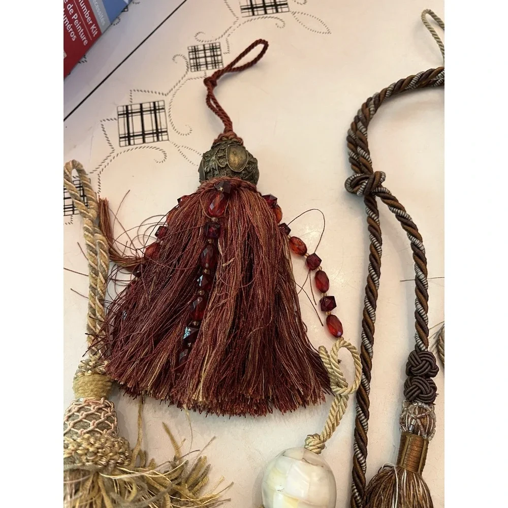 Lot Of 9 Decorative Tassels Attached Looped Cords 7 Lg. 1 All Beads 1 Wood Beads
